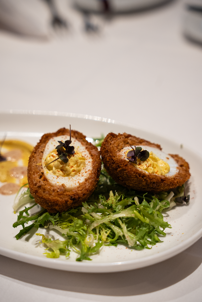 Bistro Napa at Atlantis Casino Resort Spa's Deviled Scotch Eggs for 2026 Reno Food & Drink Week. Photo by Fullsphere Digital.