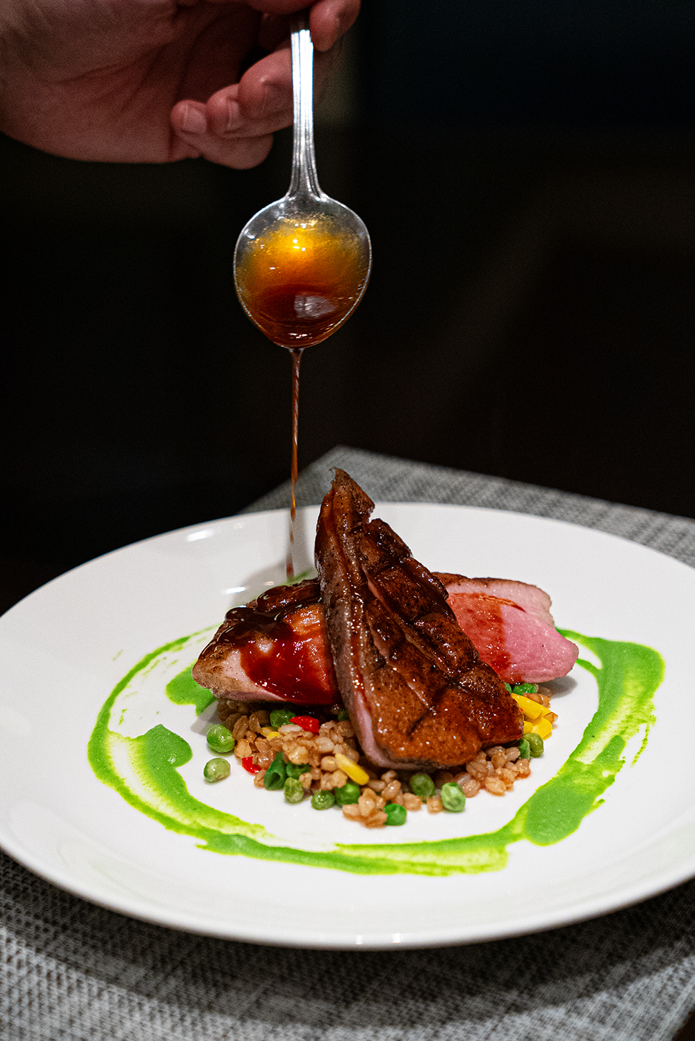 Charlie Palmer Steak at Grand Sierra Resort's Seared Duck Breast for 2026 Reno Food & Drink Week. Photo by Fullsphere Digital.