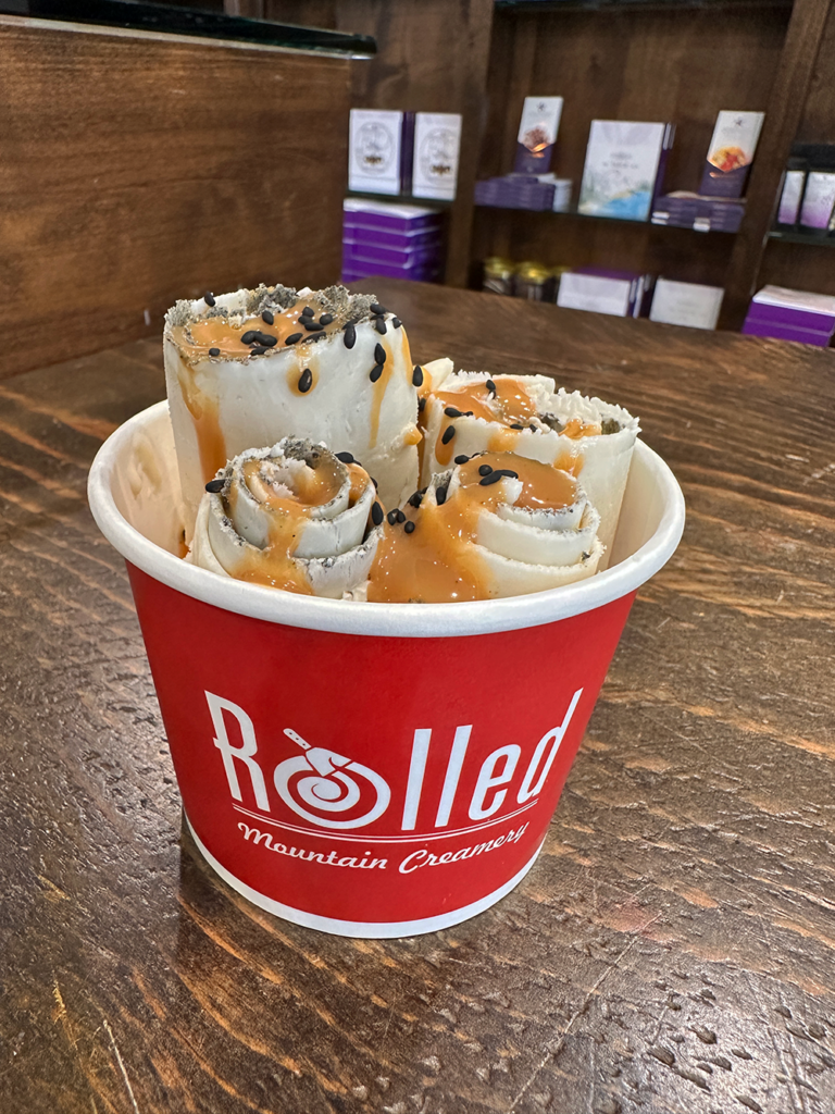 Rolled Mountain Creamery's Miso Caramel Black Sesame Rolled Ice Cream for 2026 Reno Food & Drink Week. Photo by Hungry in Reno.